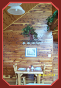 20 foot ceilings, all cedar log furniture, red cedar and white oak walls and ceilings